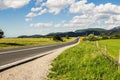 Summer carpathian landscape with green field and road Royalty Free Stock Photo