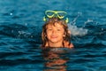 Summer child. Funny child on beach. Boy swim in sea on summer holidays. Happy kids swimming in the water. Little boy Royalty Free Stock Photo