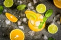 Summer citrus punch with oranges and lime Royalty Free Stock Photo