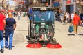 Summer city landscape - view of the janitor operating the cleaning machine on the streets of Istanbul