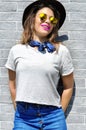 Summer city vibes. Sunny lifestyle fashion portrait pretty young woman wearing trendy outfit sunglasses