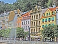 Summer street with old house, river and fountain in Karlovy Vary, Czech Republic Royalty Free Stock Photo