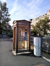 View of wooden telephone box on the street, Karlovy Vary, Czech Republic