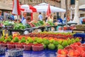 Summer cityscape - view of the fruit counter at the Gunduliceva Poljana Market in the Old Town of Dubrovnik