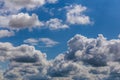 Summer clouds on blue sky at daylight in continental europe. Close shot with telephoto lens