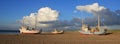 Summer clouds over fishing boats at the Slettestrand