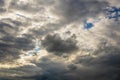 Summer cloudy stormy sky in rays of sun. Storm is coming. Royalty Free Stock Photo