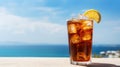 Summer cocktails, sea resort concept. Glass of iced tea. Long island cocktail on tropical beach Royalty Free Stock Photo