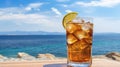 Summer cocktails, sea resort concept. Glass of iced tea. Long island cocktail on tropical beach Royalty Free Stock Photo