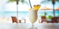 Summer coconut milk cocktail with pineapple on a table in a cafe on the beach. Pina colada Royalty Free Stock Photo