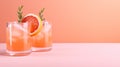 Summer cold cocktail with ice cubes, juice and slices grapefruit on pastel pink background. Generative AI.