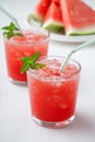 Summer cold drink with watermelon and mint on a wooden background