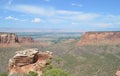 Summer in Colorado Natl Monument: Monument Canyon, Colorado River, Grand Valley & Book Cliffs From Grand View Along Rim Rock Drive Royalty Free Stock Photo