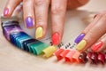 Summer colored manicure on female fingers. Royalty Free Stock Photo