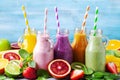 Summer colorful fruit smoothies in jars with ingredients. Healthy, detox and diet food concept Royalty Free Stock Photo