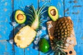 Summer composition with tropical fruits avocado and pineapple Royalty Free Stock Photo