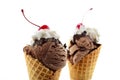 Summer concept chocolate and vanilla ice cream wafer cones.