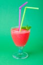 Summer concept. Fruity pink smoothies on bright colored background