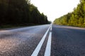 Summer country road with trees beside concept.  Empty road. Side view asphalt road. Endless straight. The concept of travel, trips Royalty Free Stock Photo