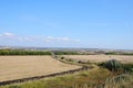 Summer countryside along the road in sunny day Royalty Free Stock Photo