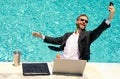 Summer crazy business man. Freelancer speak phone on summer sea beach. Crazy freelancer in suit in water. Crazy