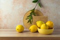 Summer creative modern still life composition with lemons on wooden table