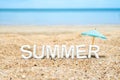 Summer (3D Rendering text) white word with beach umbrella on san