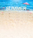 Summer 3D Rendering text white word with beach umbrella on sand beach and blue sea blur background,Summer Vacation banner