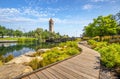 Summer day along the Spokane River in Riverfront Park with the Clock Tower, Pavilion and walking path in view Royalty Free Stock Photo