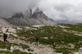 Hikers in front of Tre Cime di Lavaredo, Alto Adige, the Dolomites, Italy