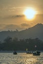 A summer day dawns on Kata beach with long tails boats moored