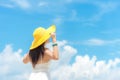 Summer Day. Lifestyle woman wearing white dress fashion summer beach on the sandy ocean beach. Happy woman enjoy and relax vacat