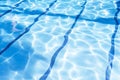 Summer day at swimming pool. Background and texture concept. Ripple Water in swimming pool with sun reflection. Royalty Free Stock Photo