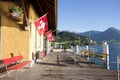 Summer day view of the Vitznau boat pier on Lake Lucerne, Lucerne, Switzerland. Swiss Pass passenger can go up to Rigi Kulm