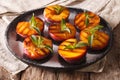 Summer dessert: grilled Peaches with powdered sugar and fresh mi Royalty Free Stock Photo