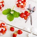 Summer dessert: strawberry with yoghurt cream and meringue in gl Royalty Free Stock Photo