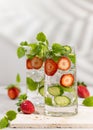 Summer detox drink. Strawberry, mint and cucumber refreshing water.Infused detox water with berry, vegetable and herb. Ice cold Royalty Free Stock Photo