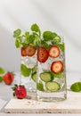 Summer detox drink. Strawberry, mint and cucumber refreshing water.Infused detox water with berry, vegetable and herb. Ice cold Royalty Free Stock Photo