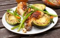 Summer dinner outside with grilled chicken and vegetables