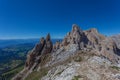 Summer dolomite rocky panorama with innumerable spiers in the Latemar Massif