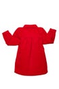 Summer dress isolated. A beautiful red girl's dress with attached heart shaped pockets and long sleeves isolated on white Royalty Free Stock Photo