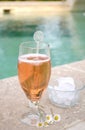 Summer drink in a glass near the swimming-pool Royalty Free Stock Photo
