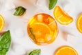 Summer drink with orange and basil Royalty Free Stock Photo