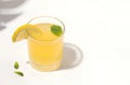 Summer drink, refreshing, fermented, kombucha lemonade with lemon on a white background. copy space.