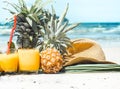 Summer drinks with fruit on the beach, exotic still life