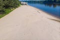 Summer drought on the river and low water on the banks Royalty Free Stock Photo