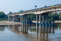 Summer drought on the river and low water on the banks Royalty Free Stock Photo