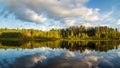 Summer evening landscape on Ural lake with pine trees on the shore, Russia Royalty Free Stock Photo