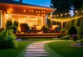 Summer evening on the patio of beautiful suburban house with lights in the garden garden