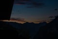 Summer evening valley with Grossarler Ache small river and blue cloudy sky